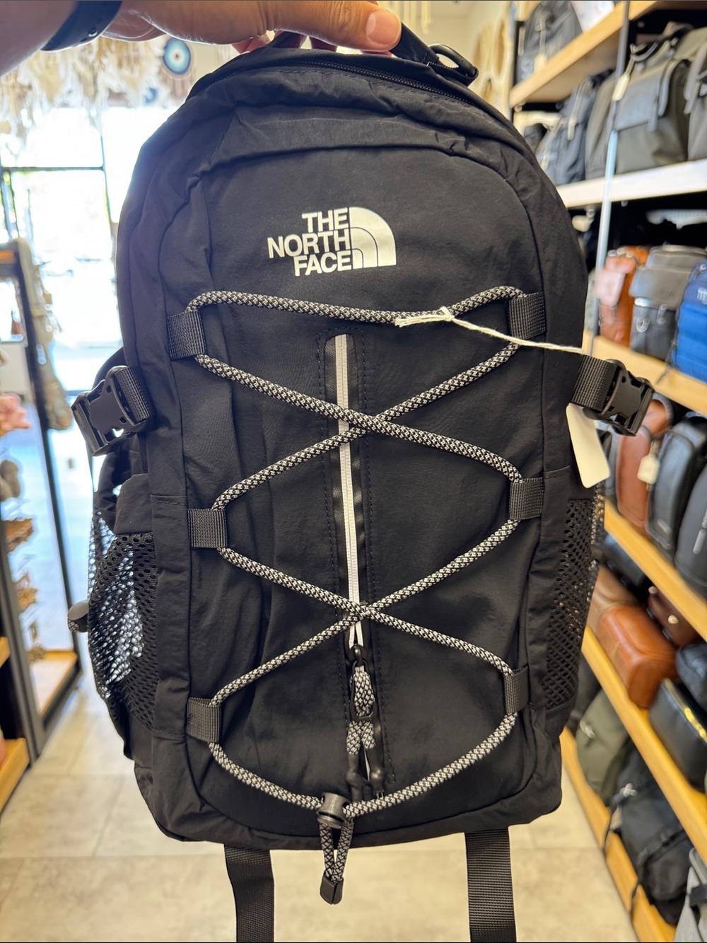 The North Face Black Backpack with Reflective Bungee Cord